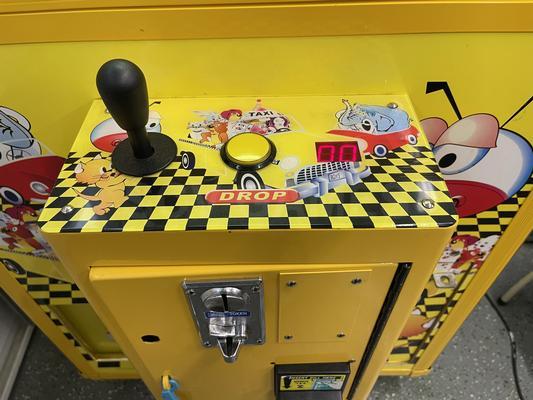2010 Betson Enterprises Toy Taxi Claw Machine Image