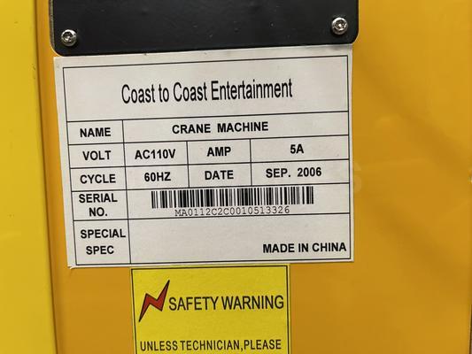 2010 Betson Enterprises Toy Taxi Claw Machine Image